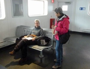 Claudette, talking with one of the passengers